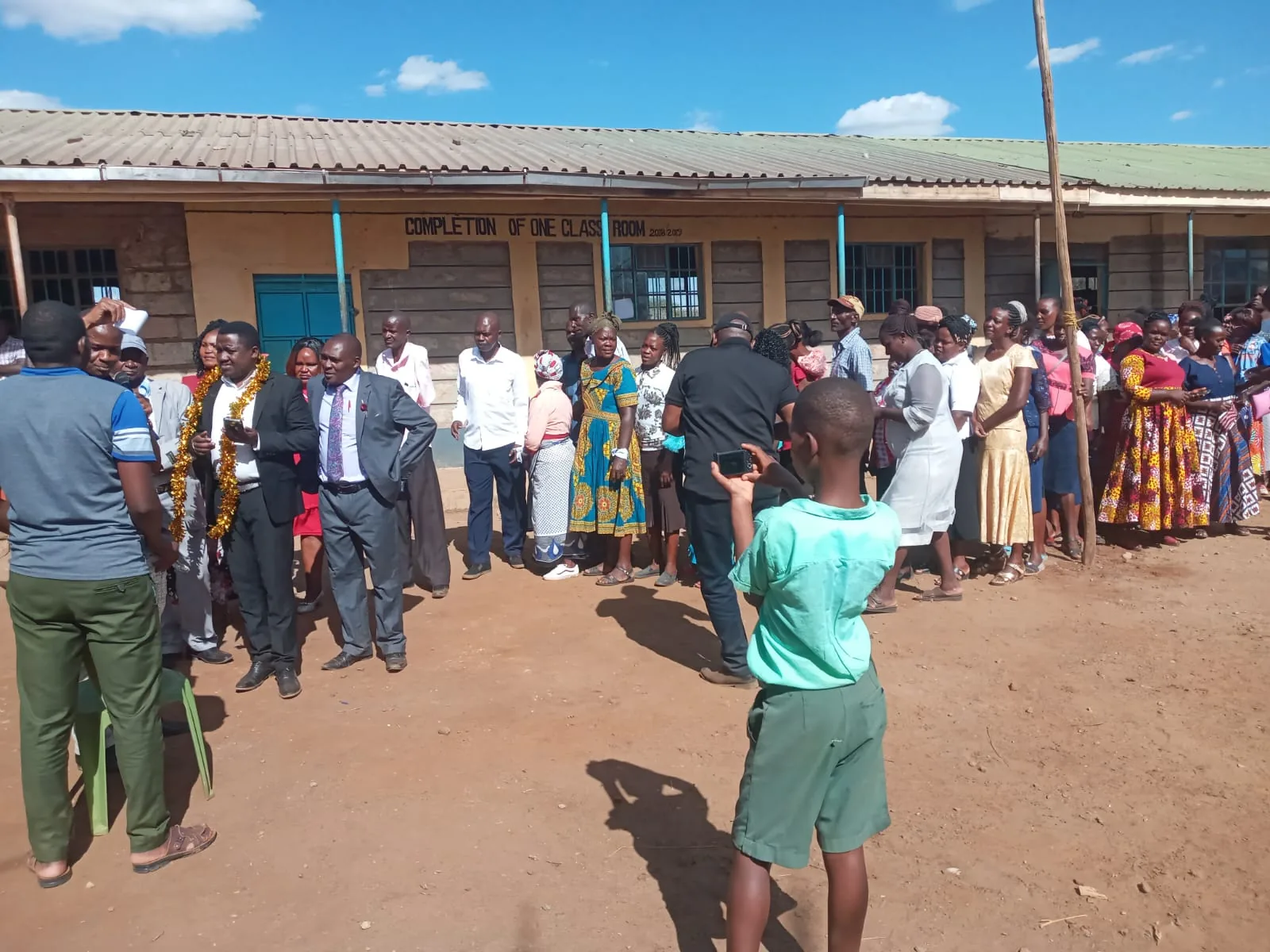 Members of the community take part in a school activity.