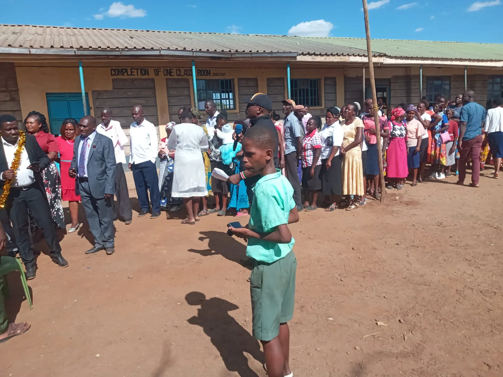Alumni and community members share the occasion with learners.