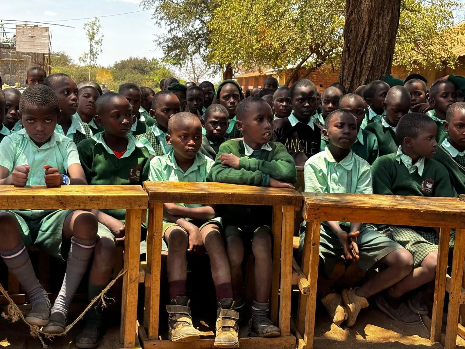 Learners listen during a school talk.